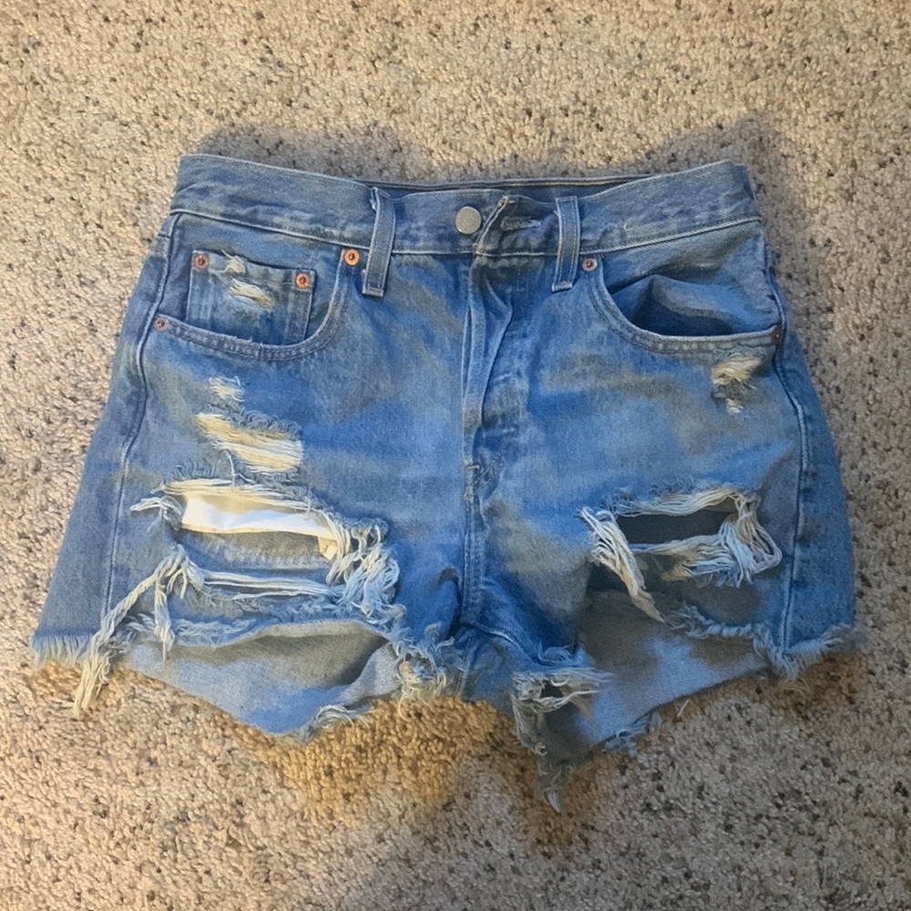 Levi’s 501 distressed denim jeans